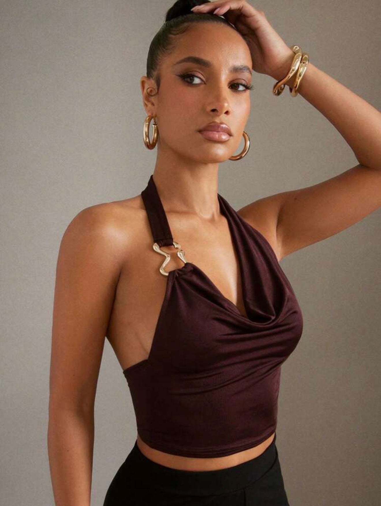 Halter crop top with a draped neckline
